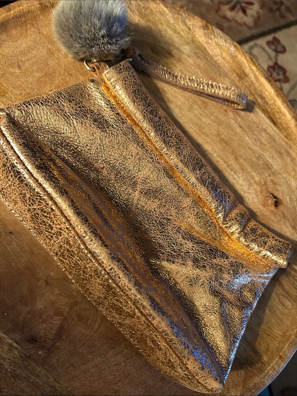 Miss Albright Metallic Bronze Zip Wristlet with Pom Pom Charm
